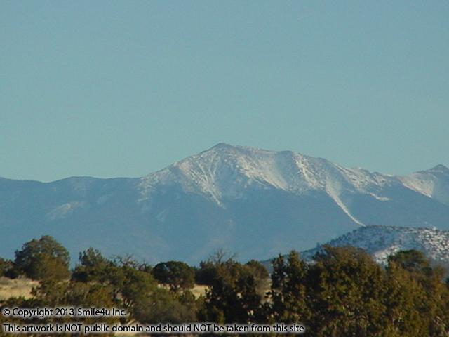 Land for sale in northern Arizona in the Grand Canyon subdivision. The San Francisco Peaks are in the distance behind where you will find the Coconino National Forest and Flagstaff!